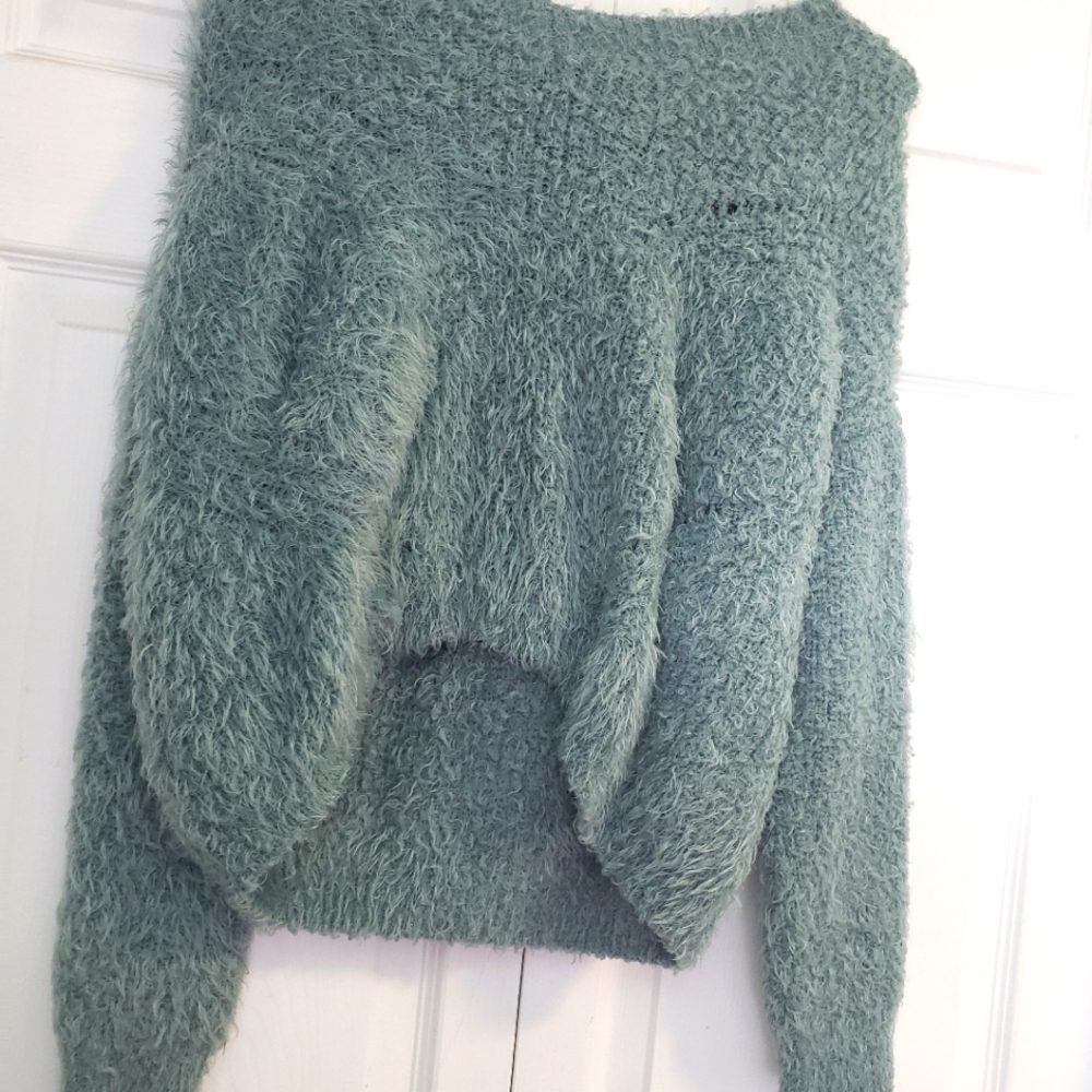 Blue-green, fuzzy sweater